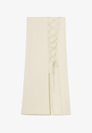 Béžová bavlnená sukňa s bočným rozparkom a šnurovaním v štýle korzetu pozdĺž ľavého švu. Ploché, čisté okraje a hladká textura.