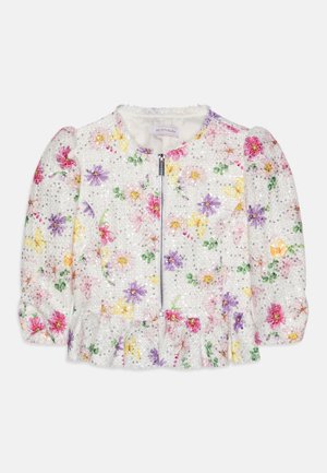 Hvid langærmet jakke med lynlås foran, blomstret print i pink, lilla, gul, grøn og små sølv palietter, der pynter stoffet.