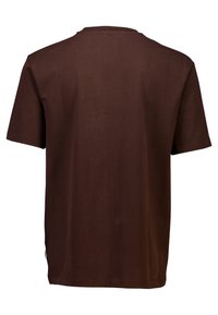 Brun kortärmad T-shirt med rund hals. Tillverkad av ett mjukt tyg, med en avslappnad passform och enkel design. Inga mönster eller accenter.