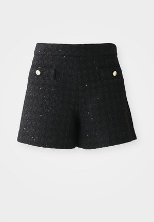 Shorts noirs texturés avec un motif tissé, présentant deux poches avant et des accents de boutons dorés à la taille.