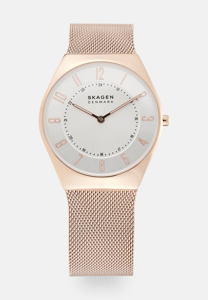 Round silver watch face with rose gold mesh band, rose gold hour markers, hands showing 10:10, and "SKAGEN DENMARK" logo at center.