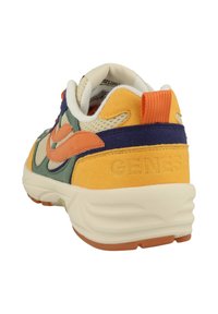 Multicolored sneaker with a mesh upper, featuring green, orange, yellow, and navy sections. Thick cream midsole and textured rubber outsole.