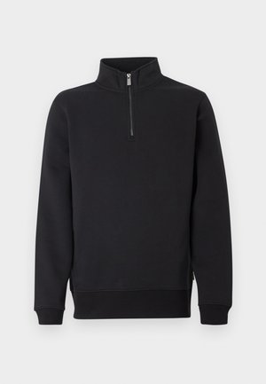Schwarzer Sweatshirt mit halbem Reißverschluss, hohem Kragen, langen Ärmeln und gerippten Bündchen. Hergestellt aus glattem Stoff mit klassischer Passform. Keine sichtbaren Logos.