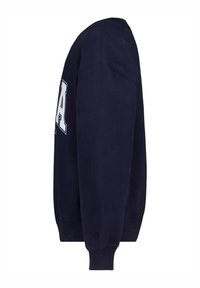 Navy blue sweatshirt, cotton material, crew neck, ribbed cuffs, and hem. Large white text lettering on the front. Side view angle displayed.