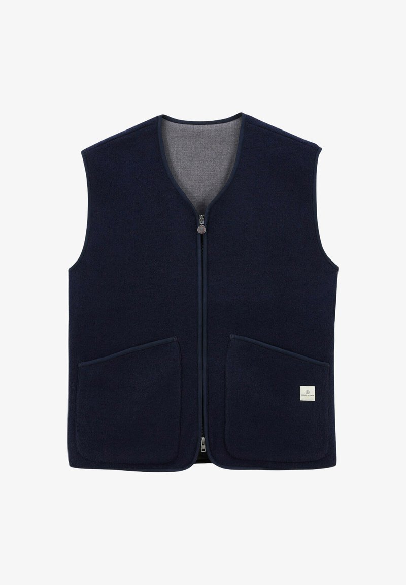 Gilet en polaire bleu marine avec fermeture éclair sur le devant, deux poches avant, et une doublure intérieure grise contrastante. Il présente une petite étiquette en bas à droite.