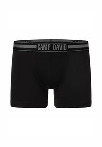 Sorte herreboksershorts med en tætsiddende pasform, lavet af strækbart stof. Har en grå elastik med "CAMP DAVID" logo.