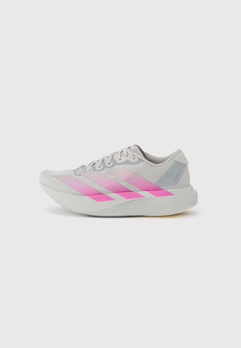 Light gray running shoe with pink gradient stripes, rounded toe, textured upper, and flat sole featuring subtle accents and logo details.