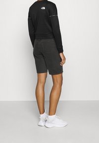 The North Face Felpa - black