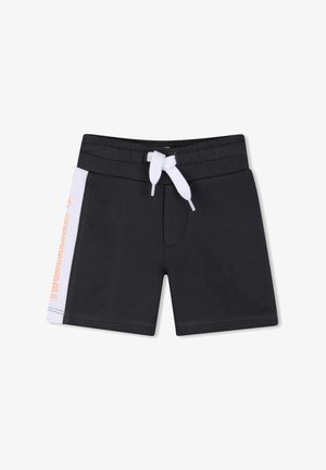 Black toddler shorts with white side stripe, white drawstring at elastic waistband, and orange text on the left side panel.