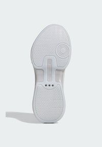 White athletic shoe sole featuring a herringbone pattern, circular heel, and three ventilation holes for breathability.