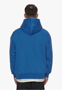 Dropsize EMBO  - Kapuzenpullover - blue