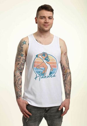 White cotton tank top featuring a colorful graphic of a character with the text "Hakuna" and a sunset design. Casual fit with wide armholes.