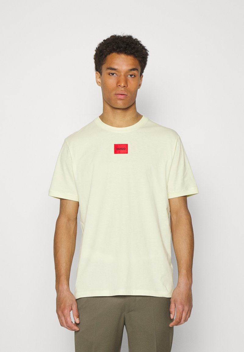 HUGO DIRAGOLINO - T-shirt básica - light pastel yellow