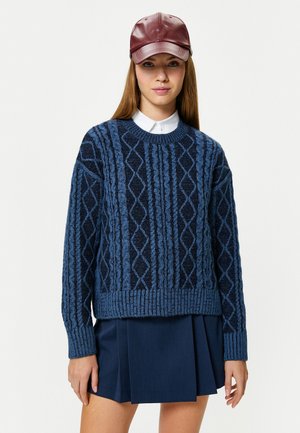 - Sweter