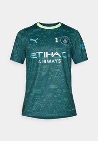 Maillot de gardien de but vert avec des motifs géométriques, arborant un logo de club circulaire, le numéro "1" et des inscriptions blanches. Manches courtes et design à col rond.