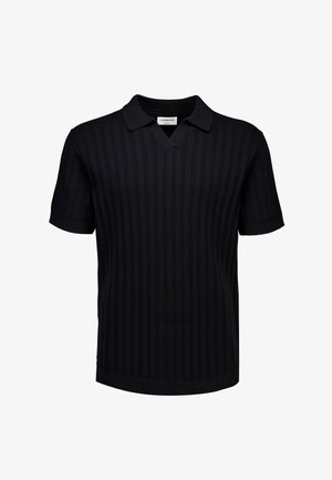 Polo nera a maniche corte in maglia con linee verticali a coste e dettaglio del colletto a V