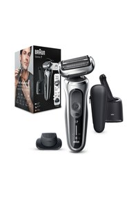 Rasoir électrique Braun Series 7 en argent, avec une tête flexible, un écran LED et une prise en main texturée. Comprend une station de nettoyage et un capuchon.