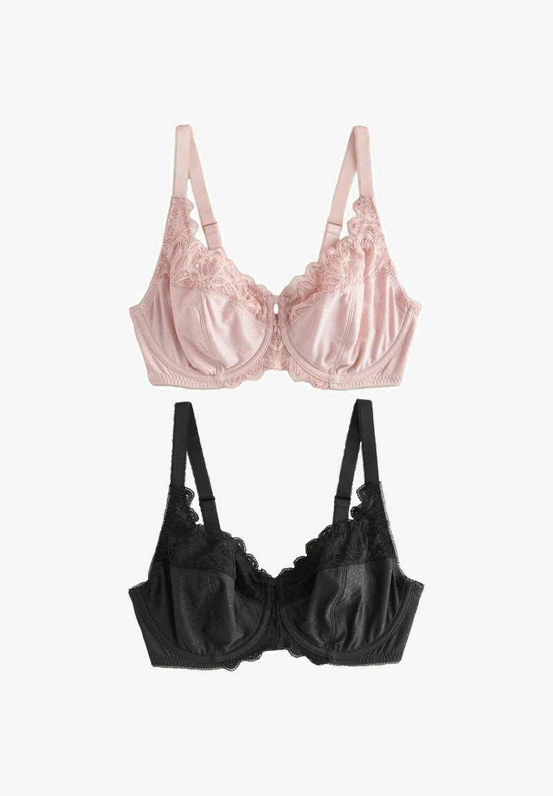 Deux soutiens-gorge à armatures avec bordure en dentelle, l'un rose clair et l'autre noir, chacun doté de bretelles réglables et d'un motif subtil à pois sur le tissu.
