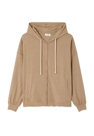 Sweat à capuche beige zippé avec poches avant, capuche avec cordon de serrage et poignets côtelés, présenté sur fond blanc.