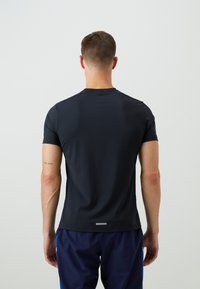 ICANIWILL MIRAGE MEN - T-skjorte til trening - black