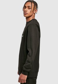 Merchcode RECKLESS BASIC CREWNECK - Sweatshirt - black