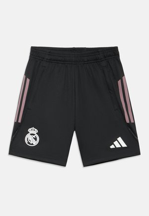 Shorts noirs avec des bandes roses adidas, taille élastique, poches latérales et logo Real Madrid brodé en blanc à l'avant. Tissu léger.