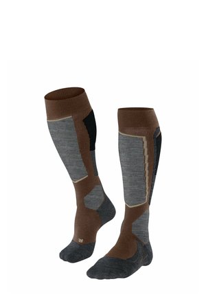 Calzini marroni, grigi e neri fino al ginocchio; polsini a coste, tallone e punta rinforzati, design segmentato con aree imbottite per il comfort.