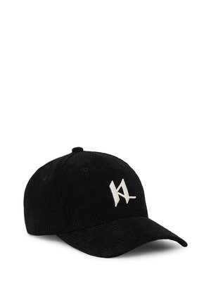 Casquette de baseball en velours côtelé noir avec un logo brodé blanc à l'avant, couronne structurée et visière courbée.