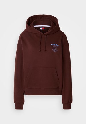 Hanorac maro cu buzunar frontal, glugă ajustabilă cu șnur și logo grafic pe piept.Mânșon și tiv cu margini ribbate. Textură moale a materialului.