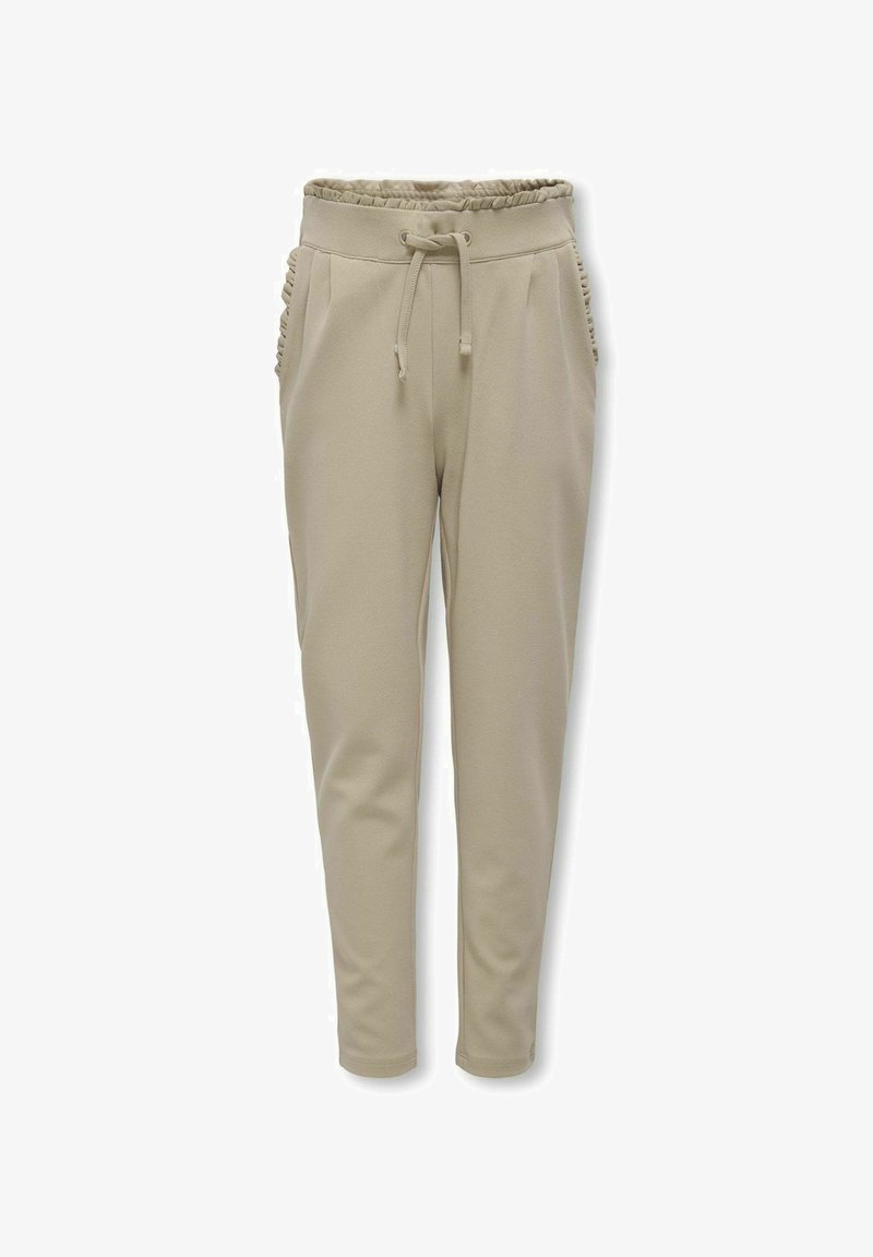 Beige jogger-housut, joissa on kerätty elastinen vyötärö, kiristysnauha ja sivutaskut, joissa on röyhelökoristeet. Sujuva tekstiili kauttaaltaan.