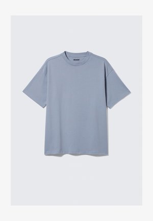 Light blue short-sleeved t-shirt made of cotton. Features a round neckline and relaxed fit, with subtle stitching detail on shoulders.