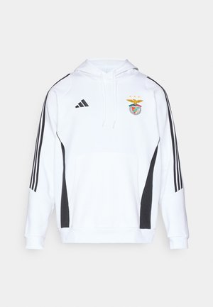 Valkoinen huppari mustilla sivusomisteilla ja jokaisessa hihassa kolme mustaa raitaa. Siinä on etutasku ja brodeerattu joukkueen logo rinnassa.