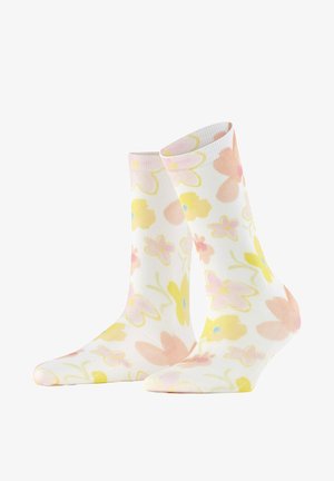 Chaussettes blanches basses avec des motifs floraux pastel jaune, rose et pêche, ainsi que des tiges et feuilles vert clair.