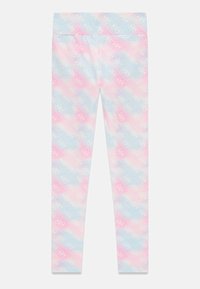 Leggings med ett gradientmönster i pastellfärger (rosa, blå) med en upprepad logodesign. Tillverkade av stretchigt tyg för komfort.
