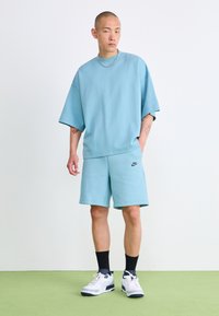 Nike Sportswear TECH FLEECE - Pamata T-krekls - denim turquoise