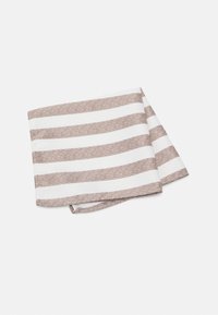 Nappe en coton avec une texture en chevrons diagonaux, alternant des rayures horizontales de couleur marron clair et blanche.
