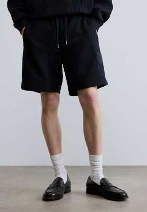 LUX HUXLEY - Tepláky - dark blue