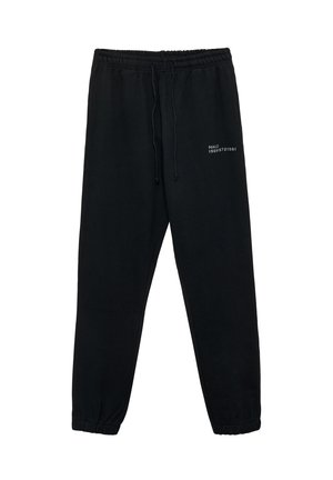Sorte sweatpants lavet af bomuldsblanding. Elastisk talje med snøre, taperet ben-design, med hvid tekstlogo på venstre side.