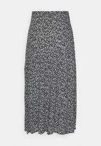 Falda midi con estampado floral en blanco y negro, de diseño fluido, con cintura alta y tejido suave. Los plisados añaden textura y movimiento.