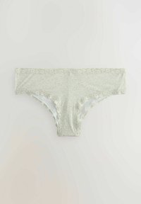 Lichtgroene onderbroek van zacht materiaal, met een gestructureerd patroon, kantafwerking langs de randen en een medium hoge taille.
