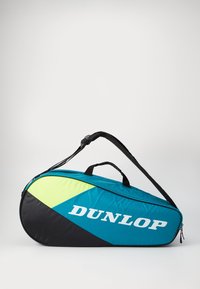 Dunlop Sporttasche, ovale Form, in Blau, Schwarz und Neon-Gelb, aus Stoffmaterial, mit einem oberen Handgriff, verstellbarem Schultergurt und Logodetail.