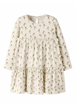 Robe bébé manches longues crème avec petit imprimé floral rose et vert et volants froncés sur la jupe et le corsage.