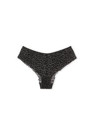 String tanga imprimé léopard noir avec tissu transparent, bordure en dentelle et bords festonnés. Offre un ajustement confortable et une couverture arrière minimale.