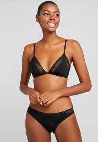 Calvin Klein Underwear FLIRTY UNLINED - Triangel BH - black