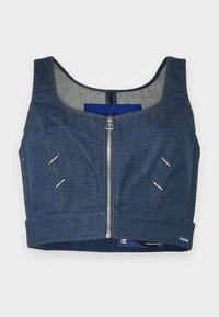Kratka denim majica v temno modri barvi z okroglim izrezom, sprednjim zadrgo in kontrastnim šivanjem. Ima dve sprednji žepu s ukrivljenimi robovi.