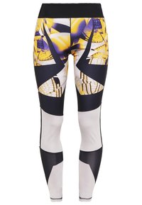 Legginsy sportowe z wysokim stanem, charakteryzujące się odważnym, żółto-czarnym wzorem geometrycznym, wykonane z gładkiego, elastycznego materiału i wyraźnymi czarnymi akcentami.