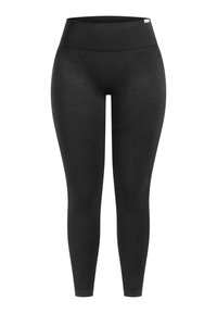 Zwarte leggings met een hoge, geribbelde tailleband, gemaakt van een zachte, elastische stof. Voorzien van gestructureerde horizontale lijnen langs de bovenbenen.