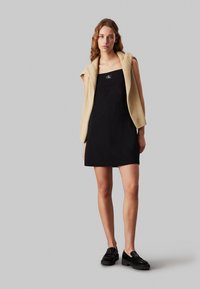 Calvin Klein Jeans MILANO A LINE STRAPPY DRESS - Džersio suknelė - black