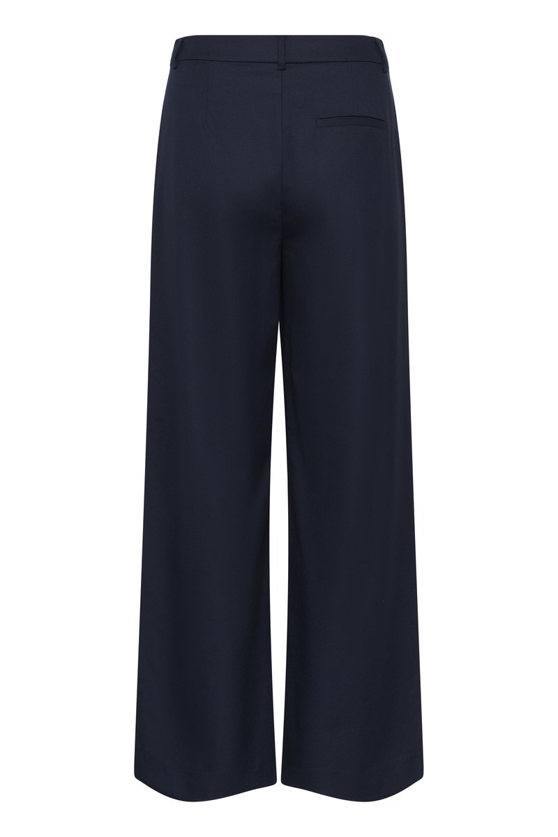 Pantalon large bleu marine avec une texture lisse, doté d'une poche arrière et d'une taille ajustée, conçu pour une silhouette décontractée.
