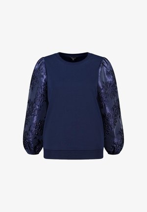 Marineblauw topje met effen lijfje en glanzende, gestructureerde bloemenpofmouwen van bijpassende donkerblauwe stof.